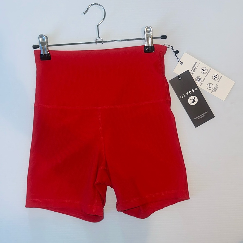 Spandex shorts in an orange/cherry color!! Ribbed material.